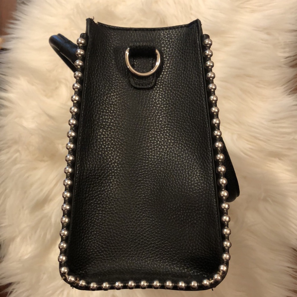 Steve Madden black handbag with adjustable crossbody/shoulder strap. - Picture 6 of 9